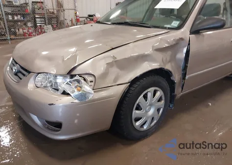 2001 Toyota Corolla Le из США, поврежденный, VIN 2T1BR12E21C500651